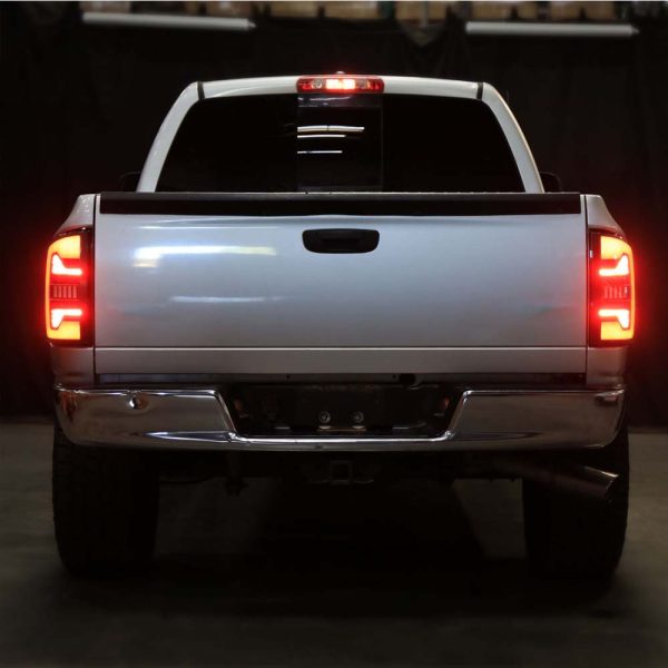 2007-2009 Dodge RAM 1500/2500/3500 Red LED Bar Tail Lights (Matte Black Housing/Smoke Lens) - Image 6