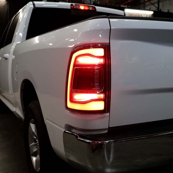 2009-2018 Dodge RAM 1500/2019-2022 RAM 1500 Classic/2010-2018 RAM 2500 3500 Red LED Bar Tail Lights (Matte Black Housing/Clear Lens) - Image 10